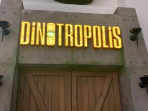 Yellow sign of Dinotropolis at Bluewater shopping centre