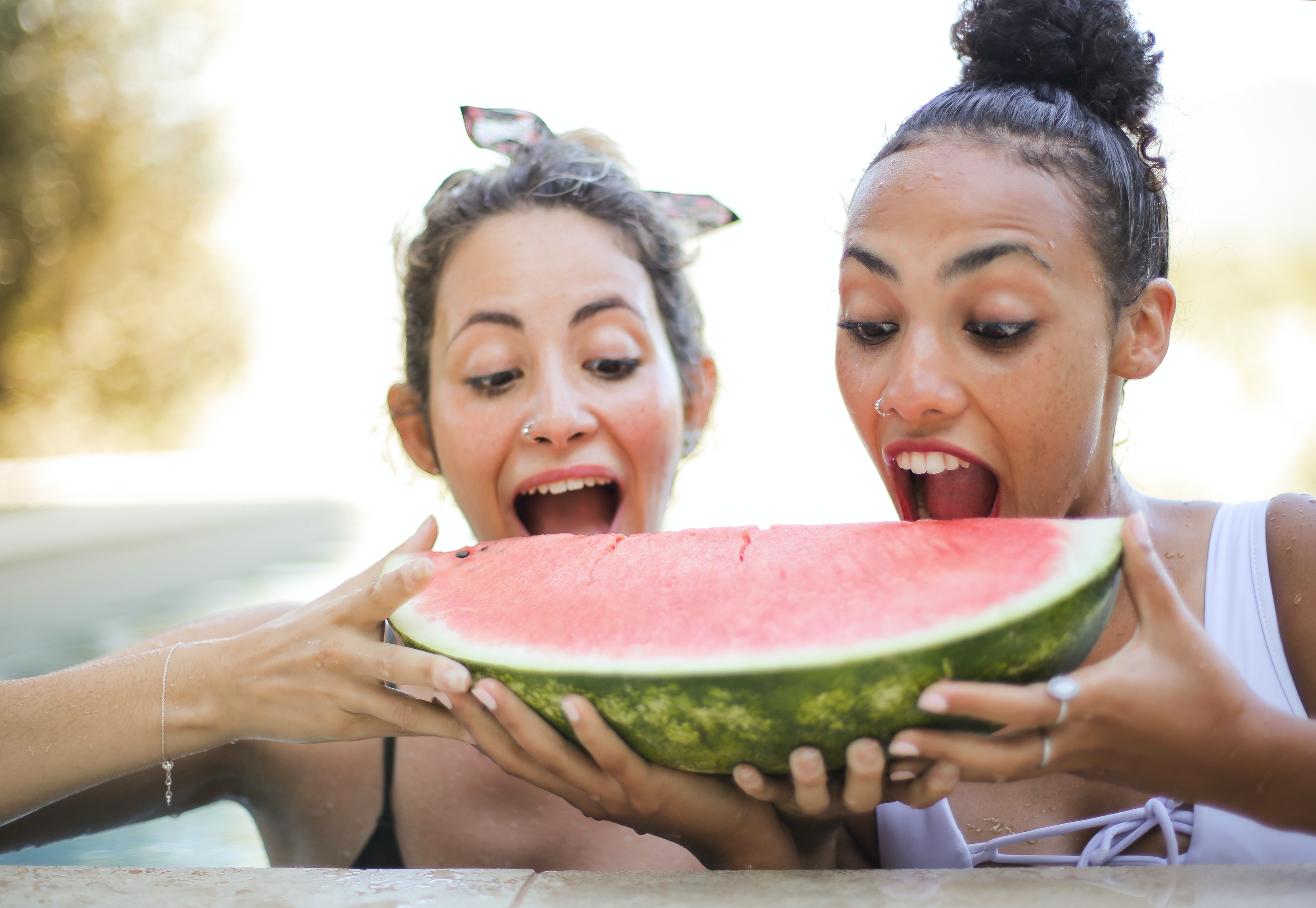 Things I want friends to know healthy eating of two women eating a watermelon