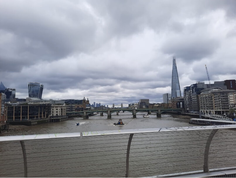 Views of The Walkie Talkie building, Tower Bridge and The Shard, from Millennium Bridge