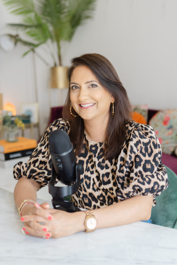 Rupa Bharadva hosting her podcast, The Courageous Collective